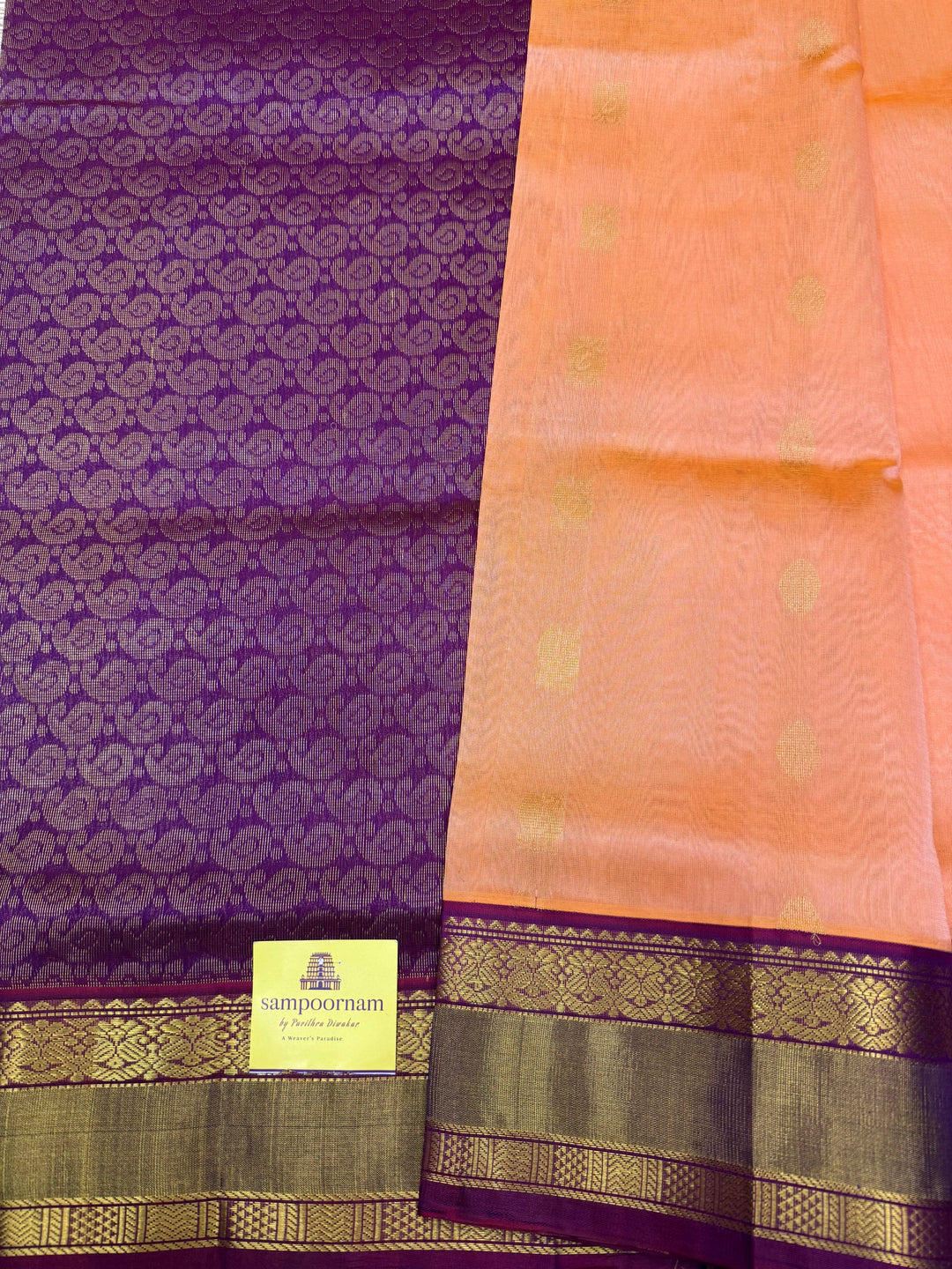 Peach Pink with Purple , Rich Annam and Chakkram Zari butta in the body and Traditional Silk borders , rich Pallu, Korvai Silk Cotton Saree
