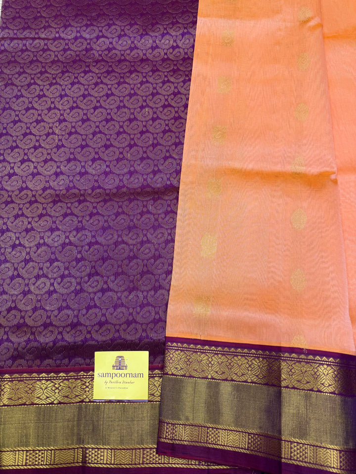 Peach Pink with Purple , Rich Annam and Chakkram Zari butta in the body and Traditional Silk borders , rich Pallu, Korvai Silk Cotton Saree