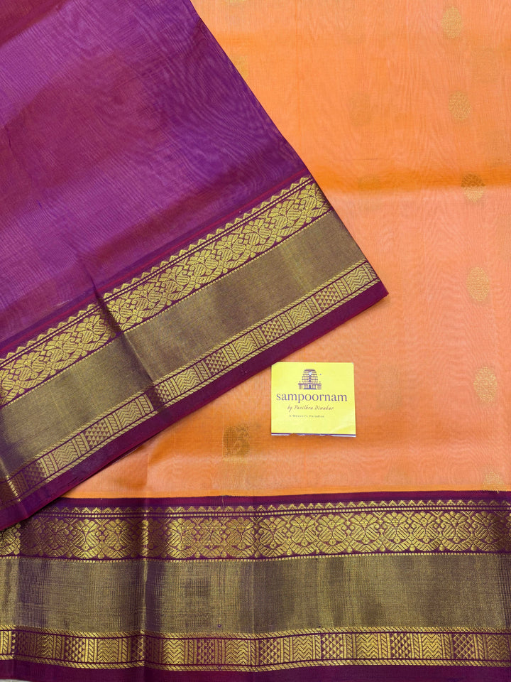 Peach Pink with Purple , Rich Annam and Chakkram Zari butta in the body and Traditional Silk borders , rich Pallu, Korvai Silk Cotton Saree