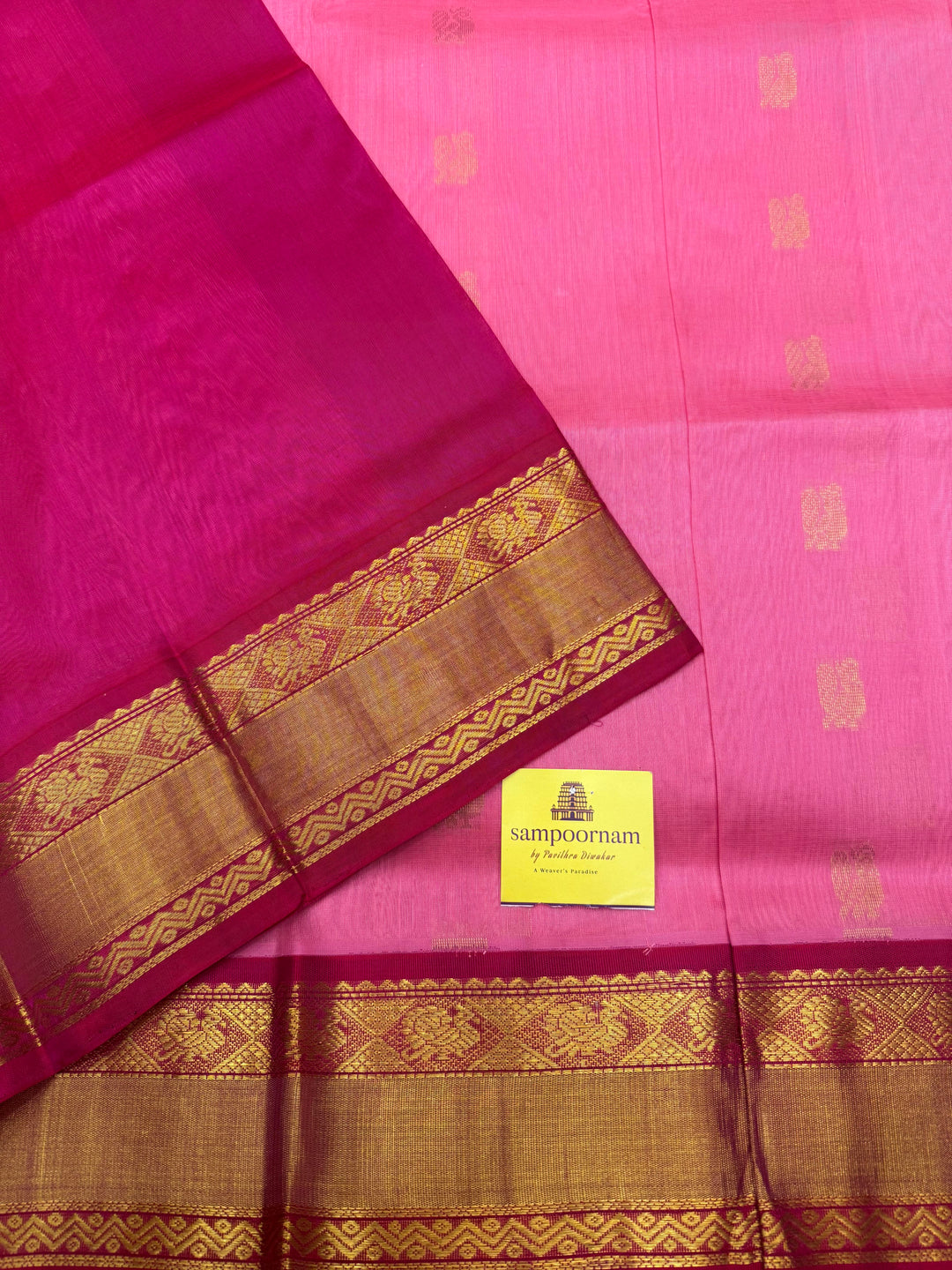 Baby Pink with Dark Pink , Rich Annam Zari butta in the body and Traditional Silk borders , rich Pallu. Korvai Silk Cotton Saree