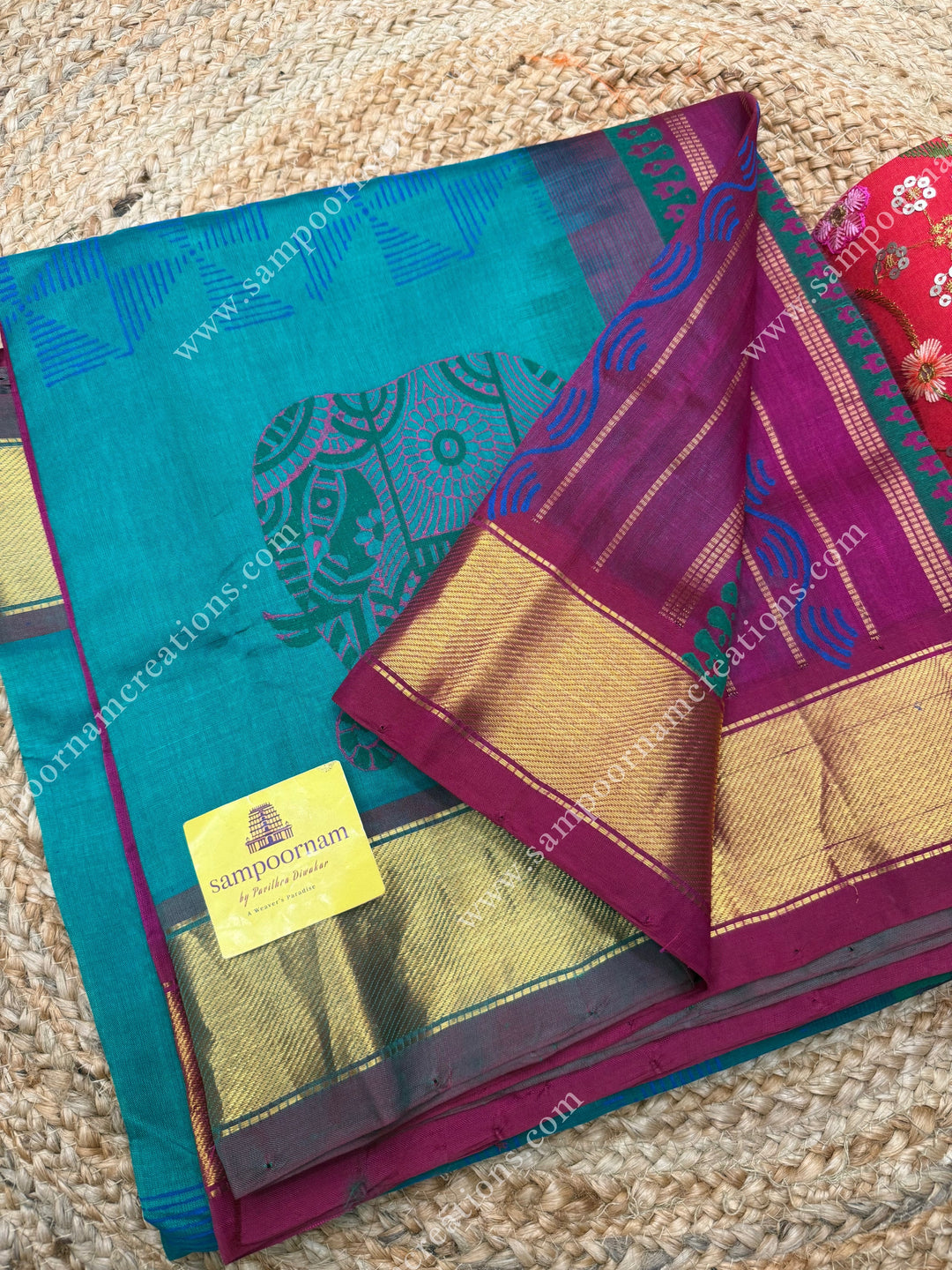 Blueish Green with Dark Magenta  , Elephant border and Geometric Print in the body  and Rich Pallu Handblock Printed Silk Cotton Saree