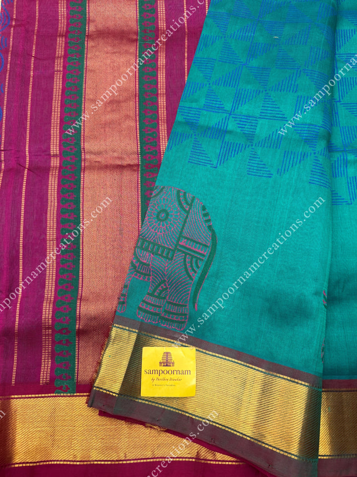 Blueish Green with Dark Magenta  , Elephant border and Geometric Print in the body  and Rich Pallu Handblock Printed Silk Cotton Saree