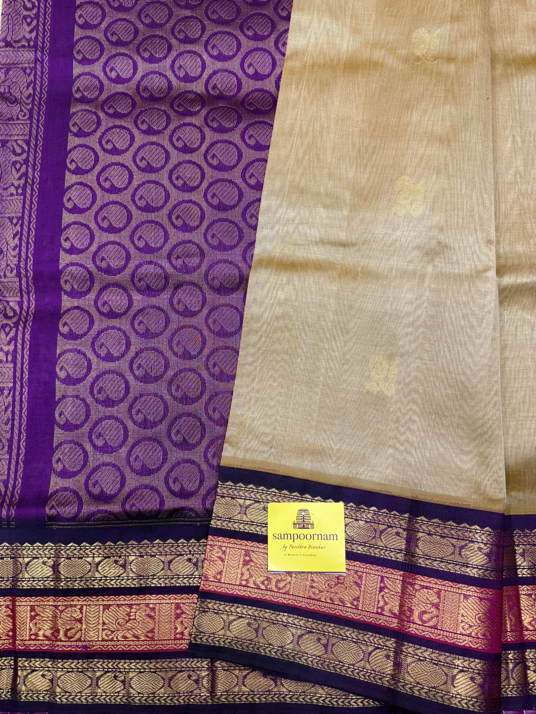 Light Gold with Purple , Rich Mango Zari butta in the body and Traditional Kanchi borders & rich Pallu Korvai Silk Cotton Saree