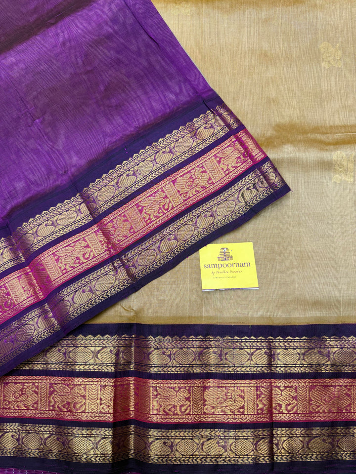 Light Gold with Purple , Rich Mango Zari butta in the body and Traditional Kanchi borders & rich Pallu Korvai Silk Cotton Saree