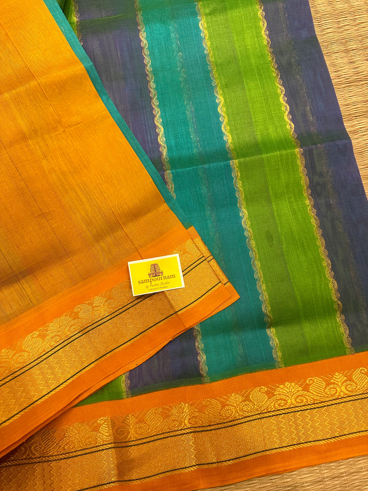 A fusion of Colours Turquoise Blue, Purple and Green with Fenugreek Colour ,Rich= Border and Pallu Korvai Silk Cotton Saree