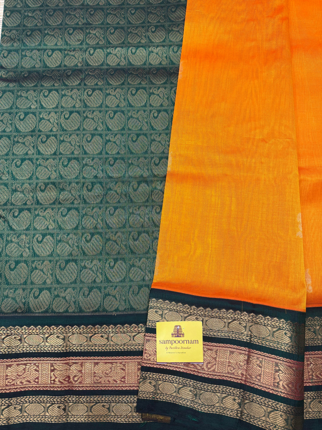 Mambazha Manjal with Green, Rich Mango Zari butta in the body and Traditional Kanchi borders & rich Pallu, Korvai Silk Cotton Saree