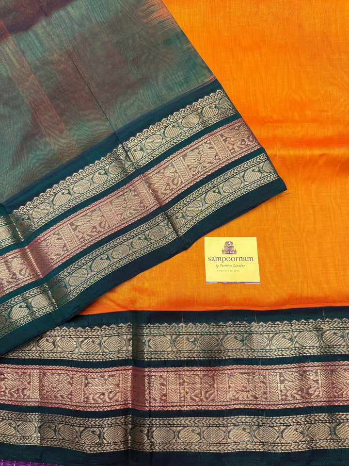 Mambazha Manjal with Green, Rich Mango Zari butta in the body and Traditional Kanchi borders & rich Pallu, Korvai Silk Cotton Saree