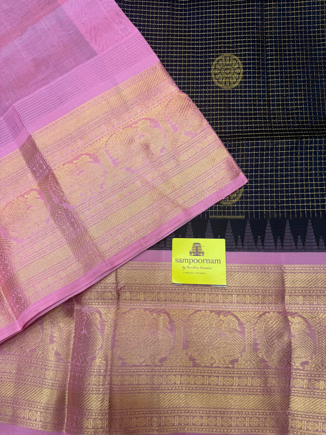 Dark Blue with Baby Pink , Rich Zari checks with Chakkram butta in the body , Traditional One side big border and rich Pallu Korvai Silk Cotton Saree