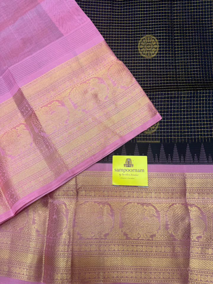 Dark Blue with Baby Pink , Rich Zari checks with Chakkram butta in the body , Traditional One side big border and rich Pallu Korvai Silk Cotton Saree