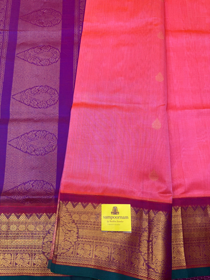 Pink with Magenta , Rich Thilagam Zari butta in the body , One side big borders and rich Pallu Korvai Silk Cotton Saree