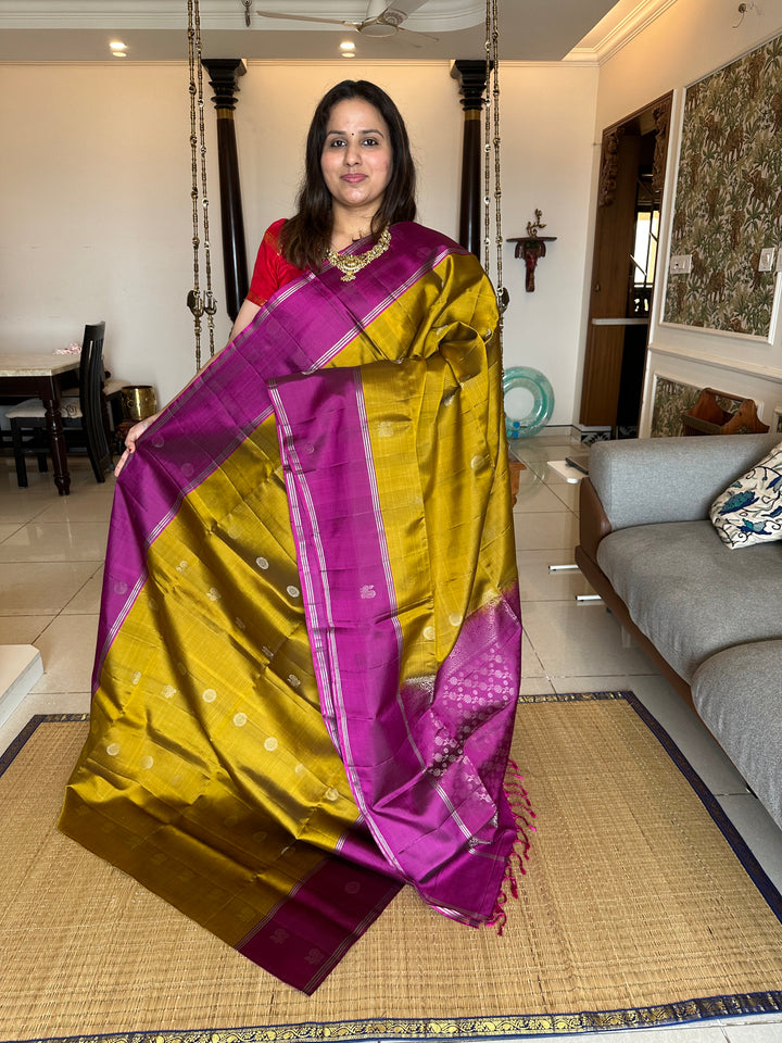 Fenugreek Gold with Magenta Mayil and Chakram Butta Silver Zari Pure Soft Silk Saree