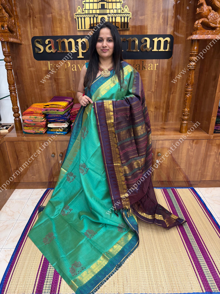Double Shaded Green with Brown , Bird Print in the body and Rich Pallu Handblock Printed Silk Cotton Saree