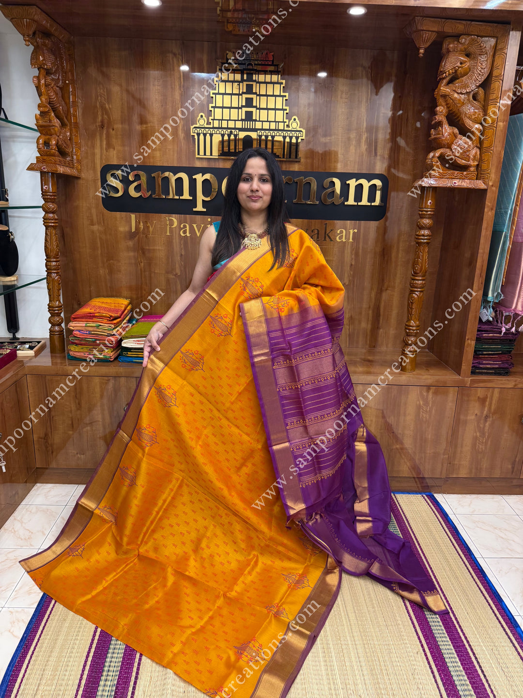 Manjal with Magenta  , Floral Print in the body  and Rich Pallu Handblock Printed Silk Cotton Saree