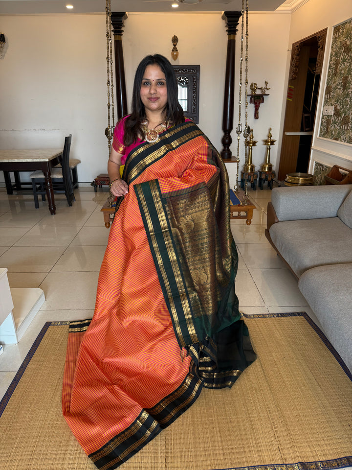 Pink and Manjal Podi Kattam with Dark Green Rettapet Border and RIch Pallu Korvai Silk Cotton Saree