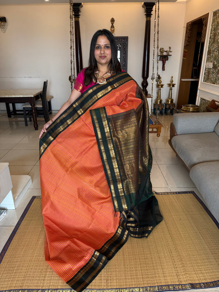 Pink and Manjal Podi Kattam with Dark Green Rettapet Border and RIch Pallu Korvai Silk Cotton Saree