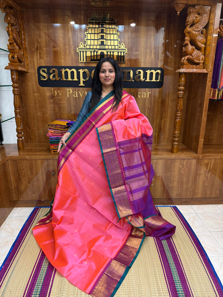 Pink with Magenta , Rich Thilagam Zari butta in the body , One side big borders and rich Pallu Korvai Silk Cotton Saree