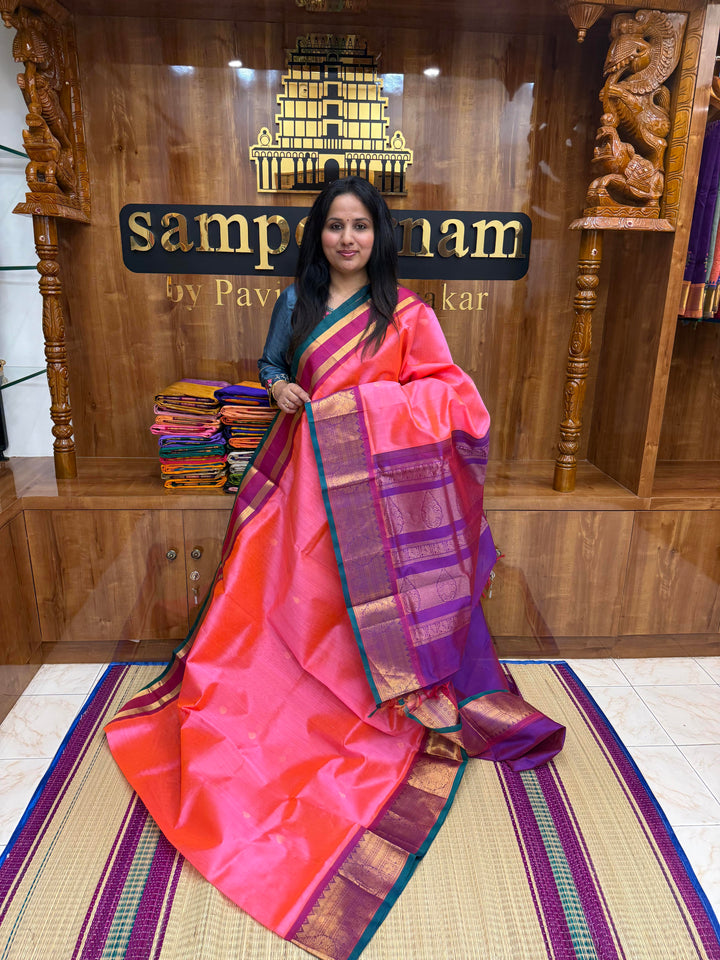 Pink with Magenta , Rich Thilagam Zari butta in the body , One side big borders and rich Pallu Korvai Silk Cotton Saree