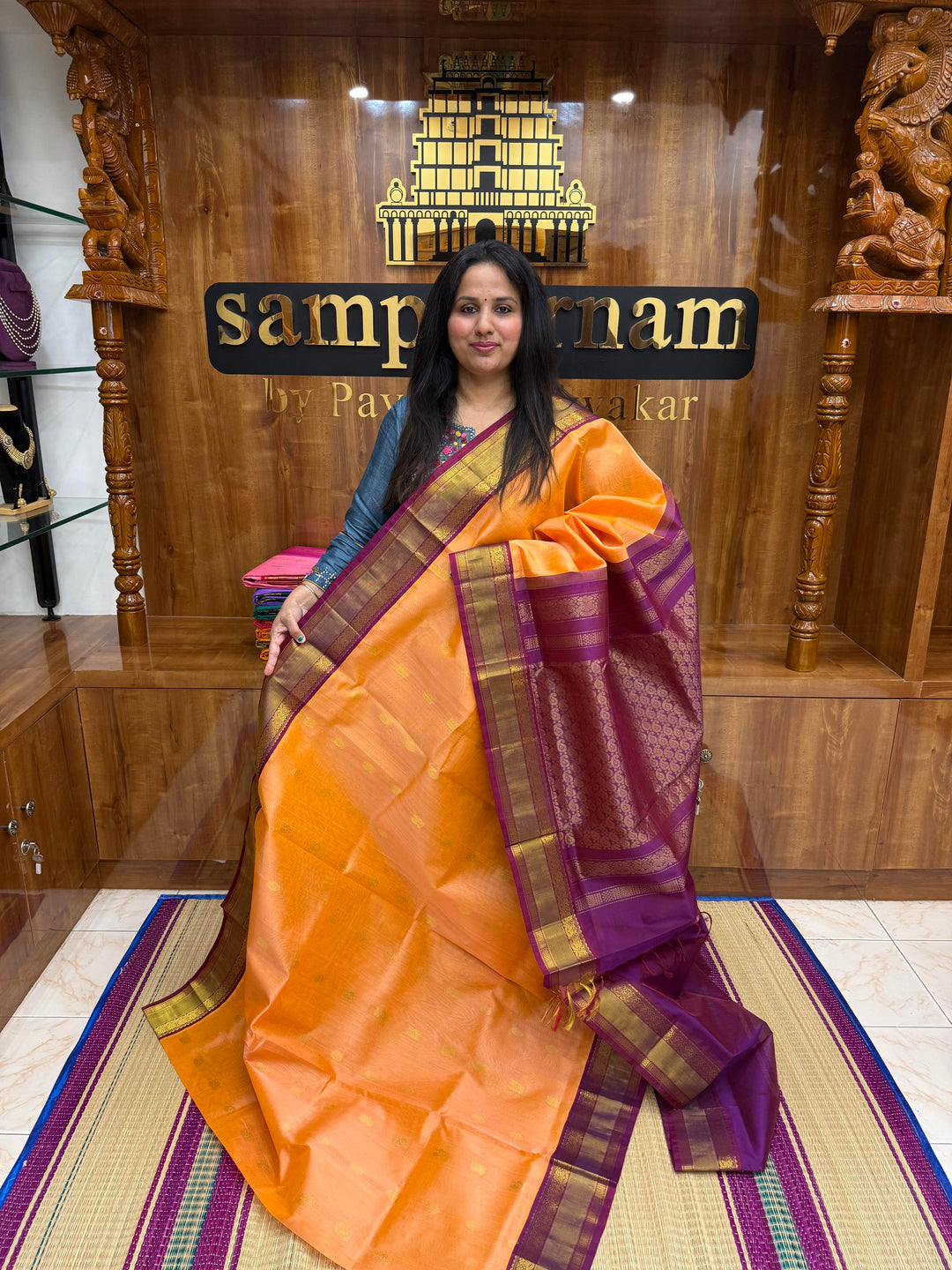 Peach Pink with Purple , Rich Annam and Chakkram Zari butta in the body and Traditional Silk borders , rich Pallu, Korvai Silk Cotton Saree