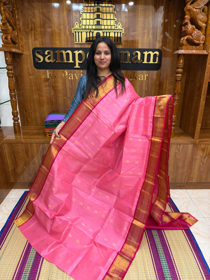 Baby Pink with Dark Pink , Rich Annam Zari butta in the body and Traditional Silk borders , rich Pallu. Korvai Silk Cotton Saree