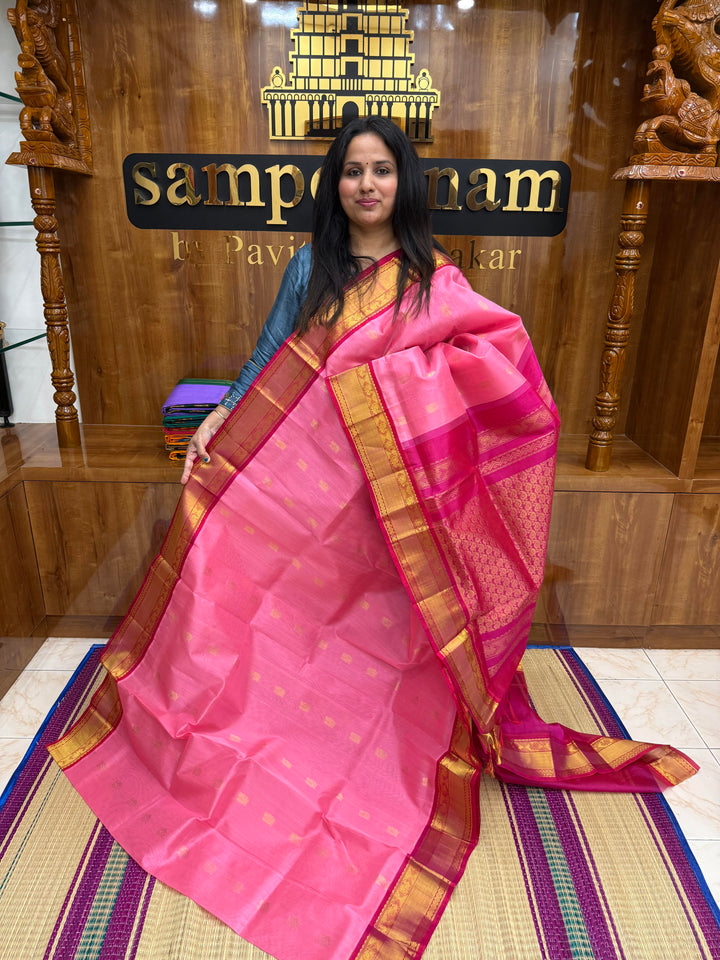 Baby Pink with Dark Pink , Rich Annam Zari butta in the body and Traditional Silk borders , rich Pallu. Korvai Silk Cotton Saree