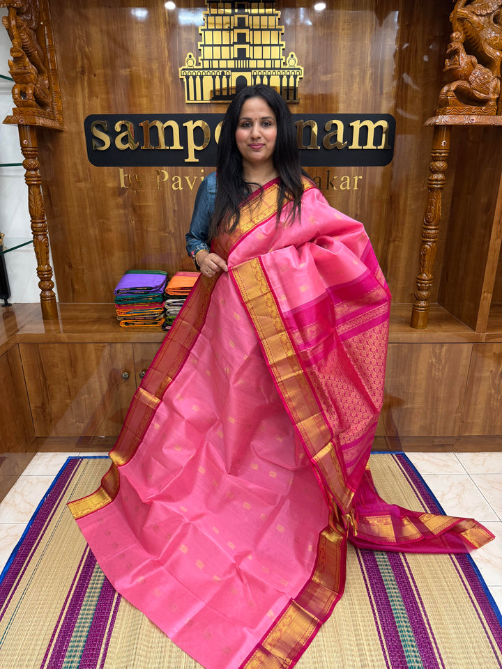 Baby Pink with Dark Pink , Rich Annam Zari butta in the body and Traditional Silk borders , rich Pallu. Korvai Silk Cotton Saree