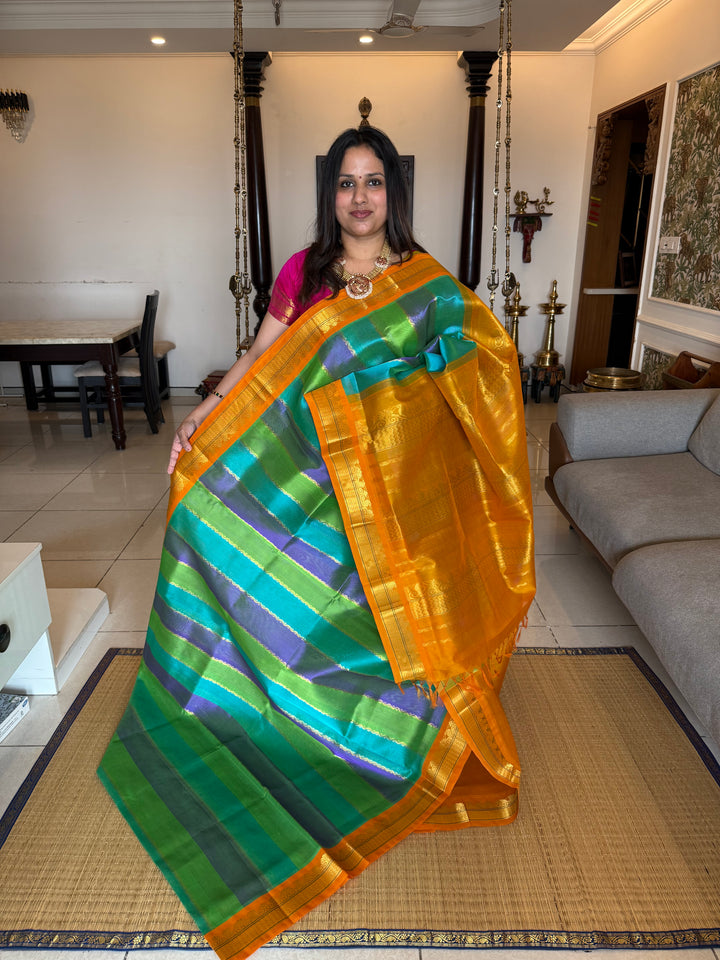 A fusion of Colours Turquoise Blue, Purple and Green with Fenugreek Colour ,Rich= Border and Pallu Korvai Silk Cotton Saree