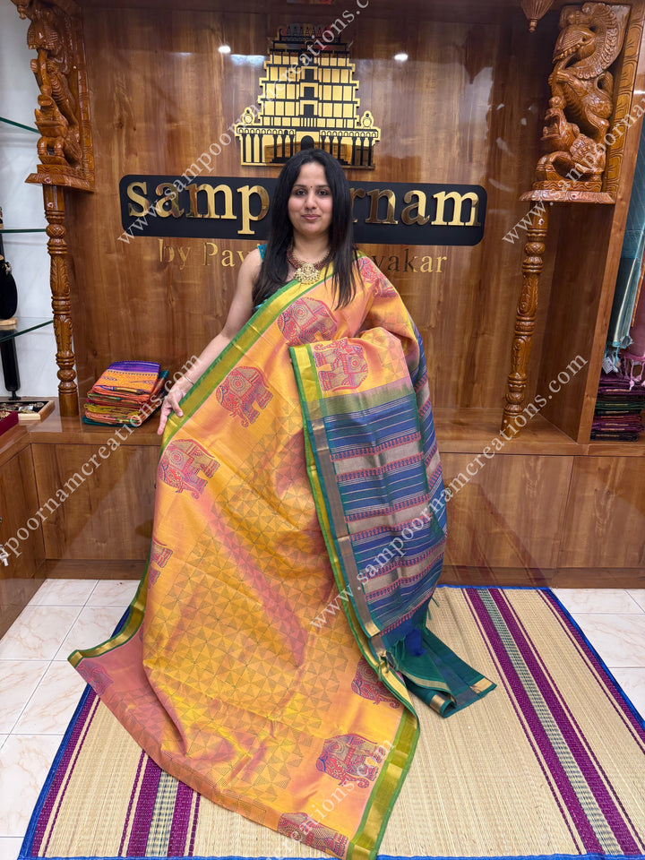 Peach with Mayilkazthu , Elephant border and Geometric Print in the body  and Rich Pallu Handblock Printed Silk Cotton Saree