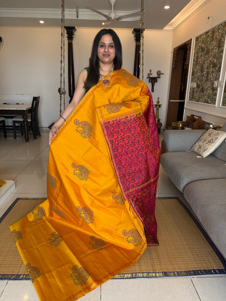 Yellow with Reddish Orange , annam Handblock print in the body , Pochampalli Pallu and Blouse  , pure soft silk saree