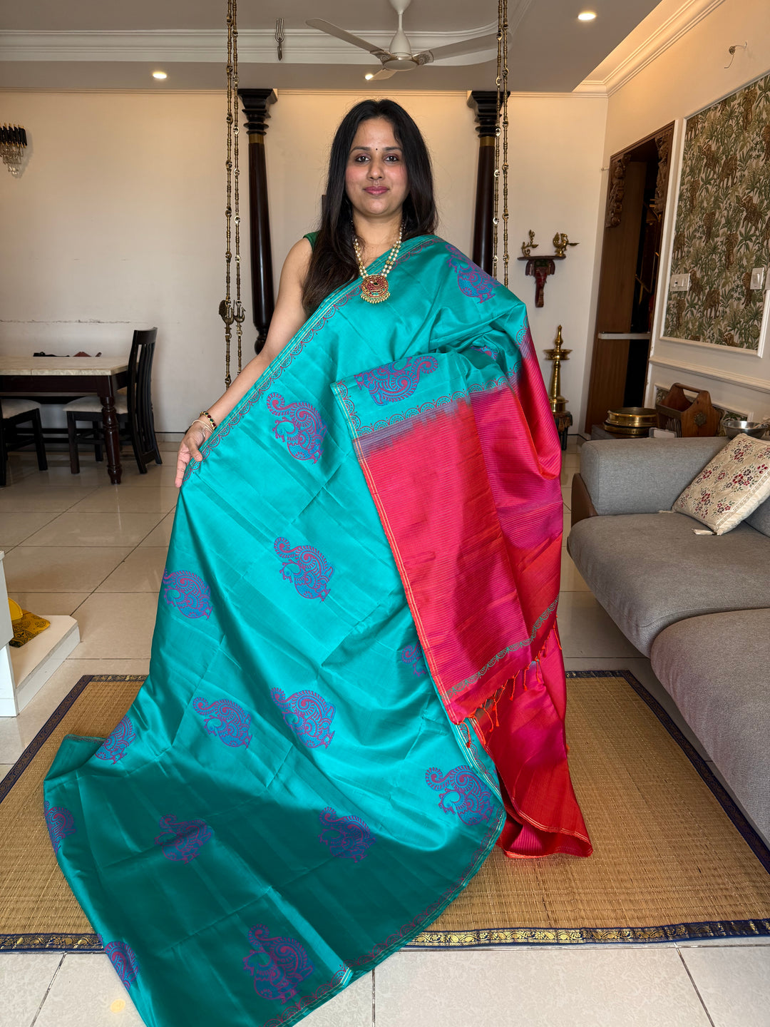 Light Blue with Orangish Pink , annam Handblock print in the body , simple zari lines in the Pallu and Blouse, pure soft silk saree
