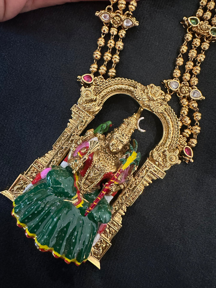 A classic three layer beaded neck piece with gold balls , red , green and white kemp stones , with Goddess Kamakshi Amman 3D Pendant .