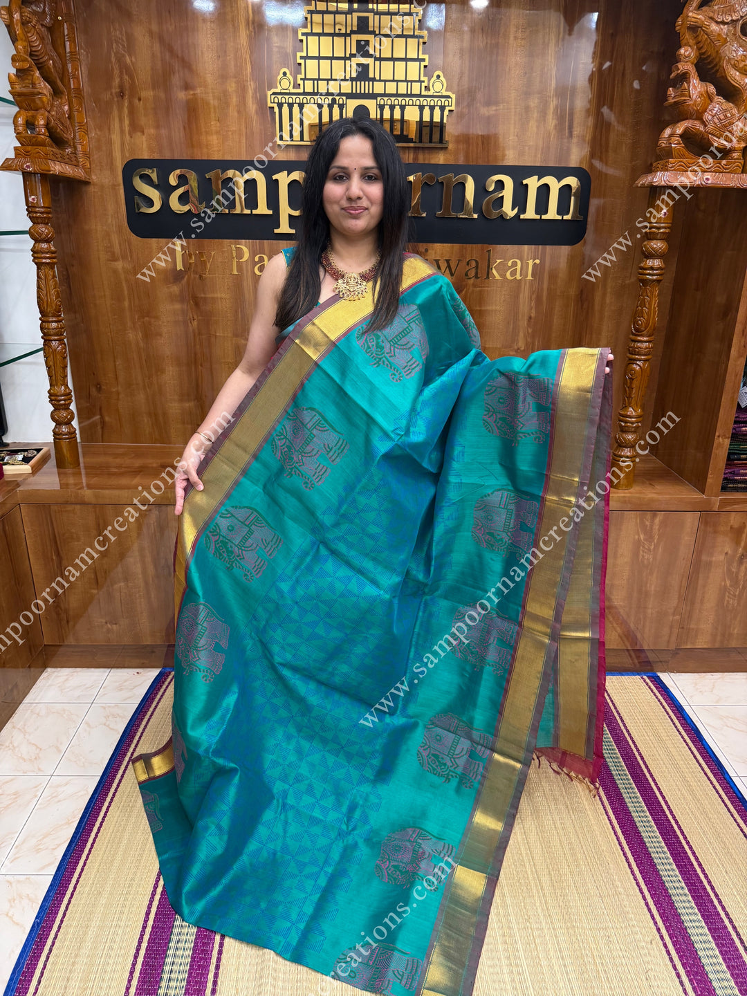 Blueish Green with Dark Magenta  , Elephant border and Geometric Print in the body  and Rich Pallu Handblock Printed Silk Cotton Saree
