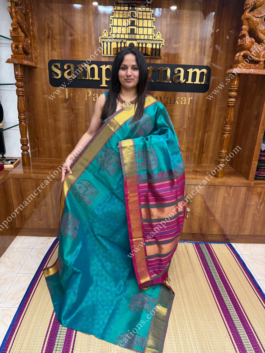 Blueish Green with Dark Magenta  , Elephant border and Geometric Print in the body  and Rich Pallu Handblock Printed Silk Cotton Saree