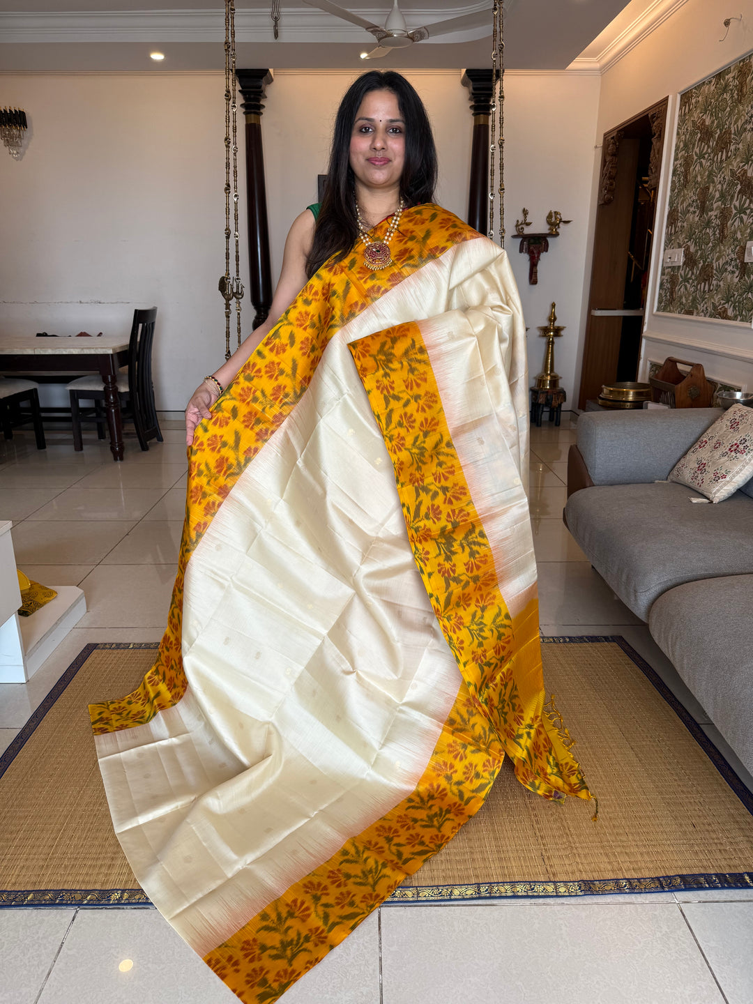 Offwhite with Yellow , Pochampally borders and blouse , Zari Mayil butta in the body and rich Pallu , pure soft silk saree