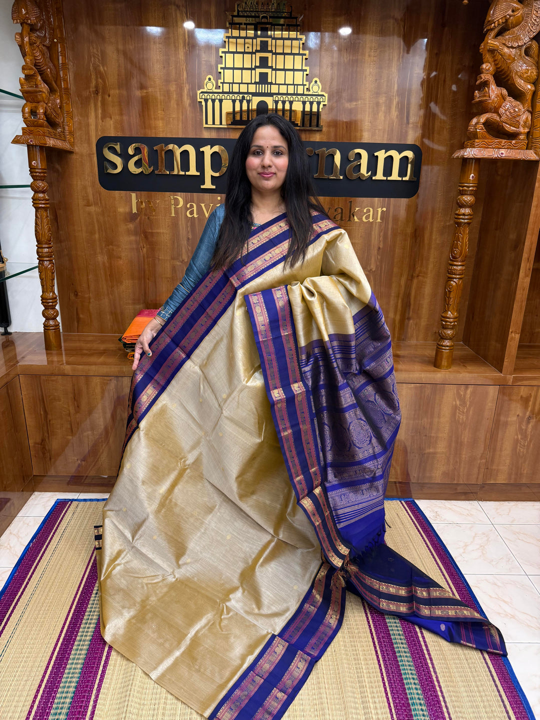 Light Gold with Blue , Rich Zari butta in the body , Rettapet borders and rich Pallu Korvai Silk Cotton Saree