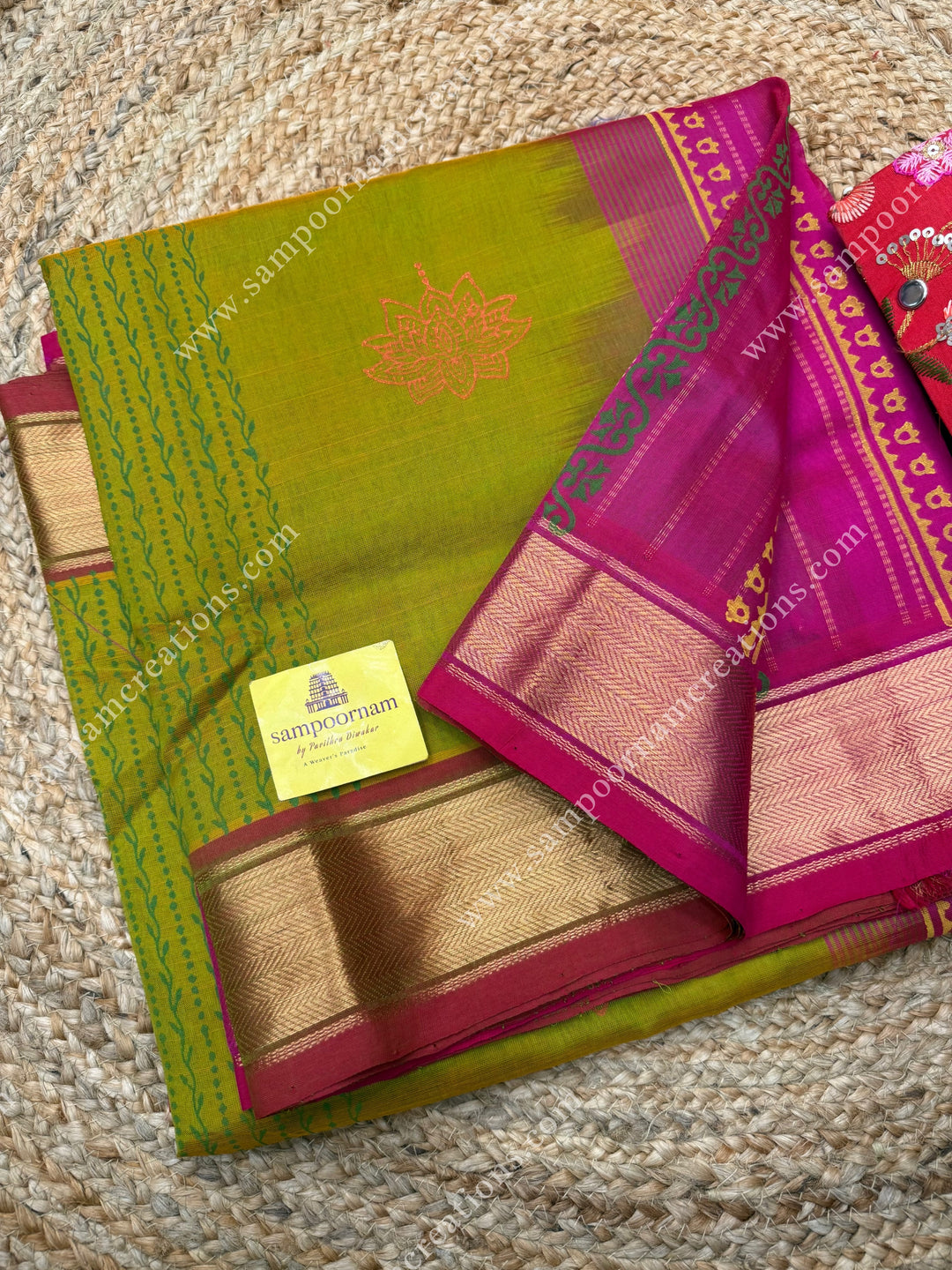 Manthulir Green with Rani Pink , Lotus motif in the body and  Rich Pallu Handblock Printed Silk Cotton Saree