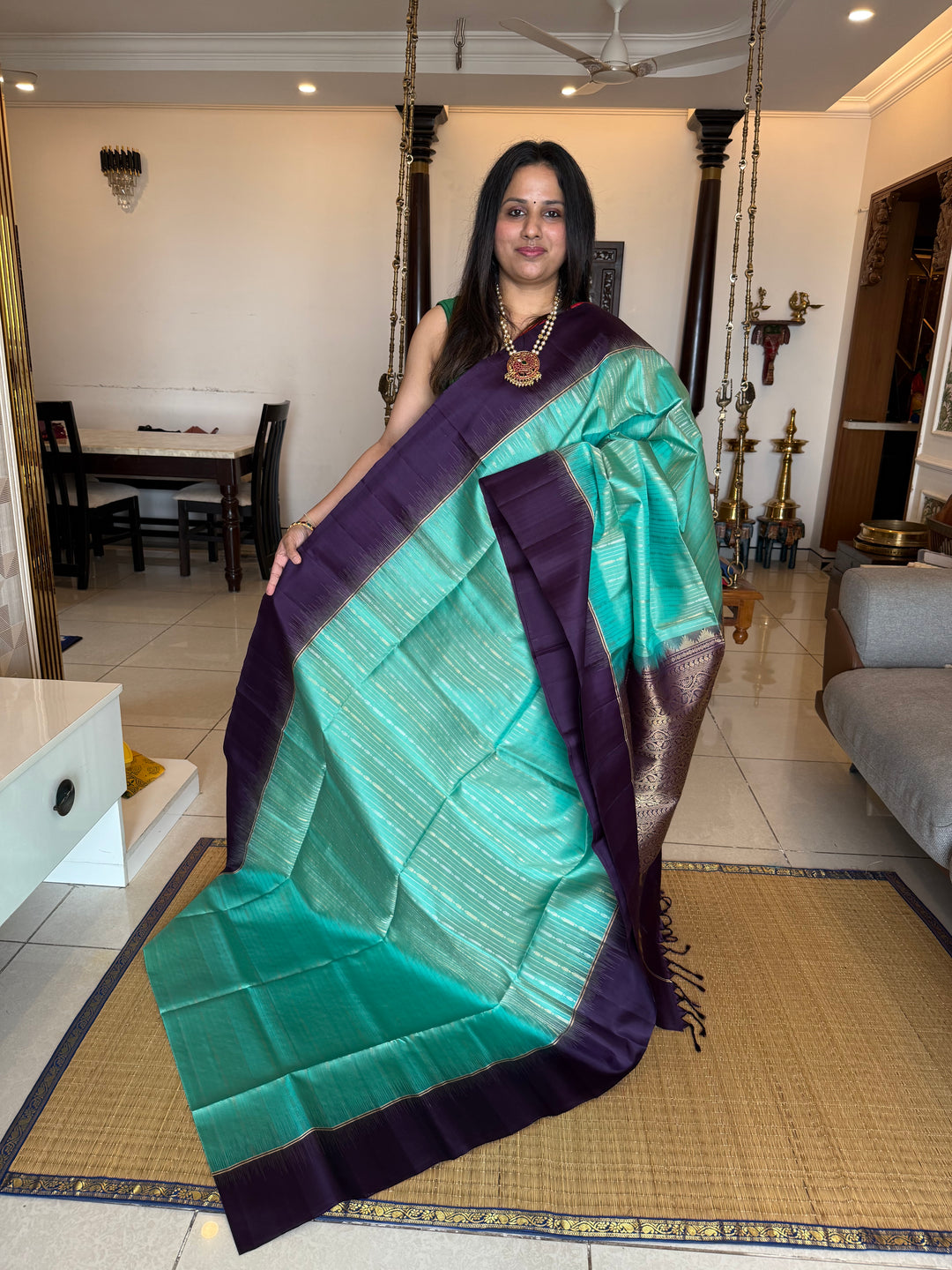 Pastel Light Blue with Purple , rich zari gold and silver zari butta in the body and grand  Pallu , pure soft silk saree