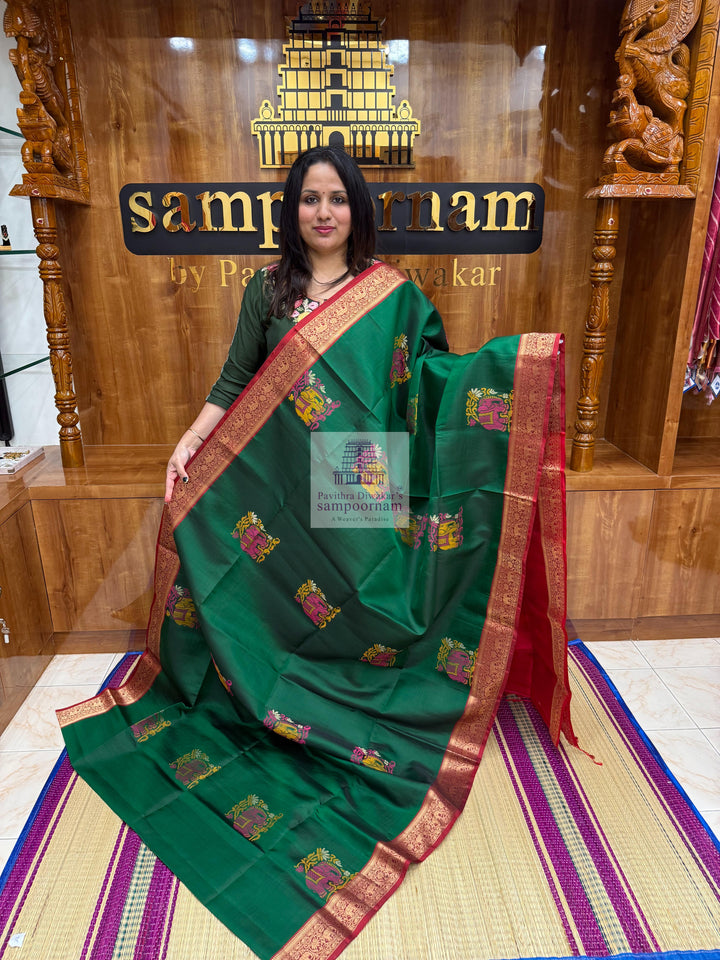 Green with Red , Thread butta in the body , rich Kanchi border and grand  Pallu Pure Soft Silk Saree