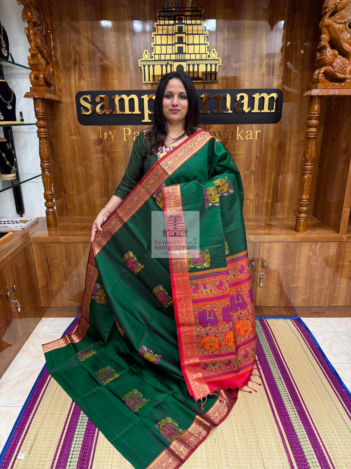 Green with Red , Thread butta in the body , rich Kanchi border and grand  Pallu Pure Soft Silk Saree