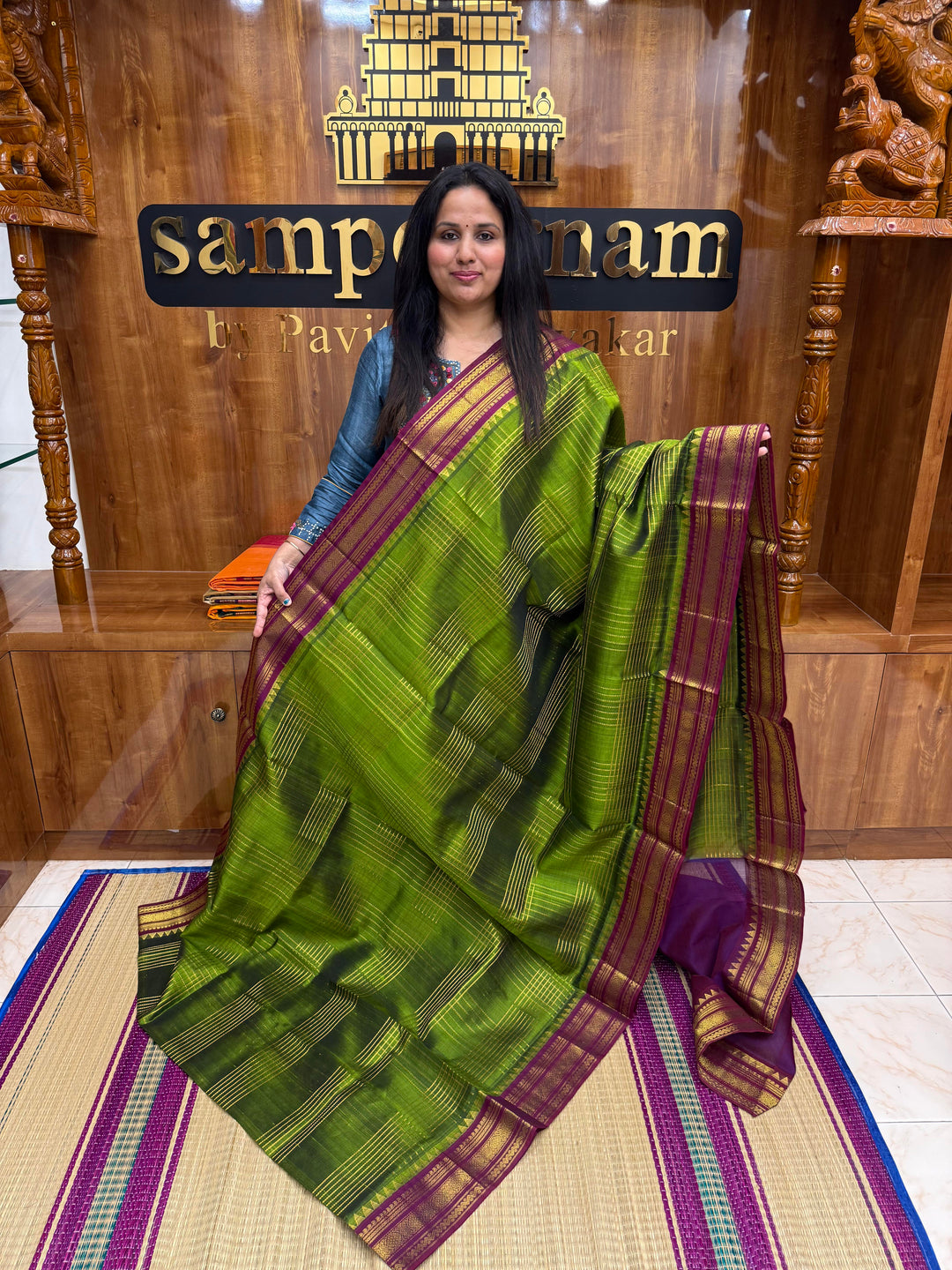Green with Dark Magenta , Zari Checks in the body , Traditional borders and Rich Pallu Korvai Silk Cotton Saree