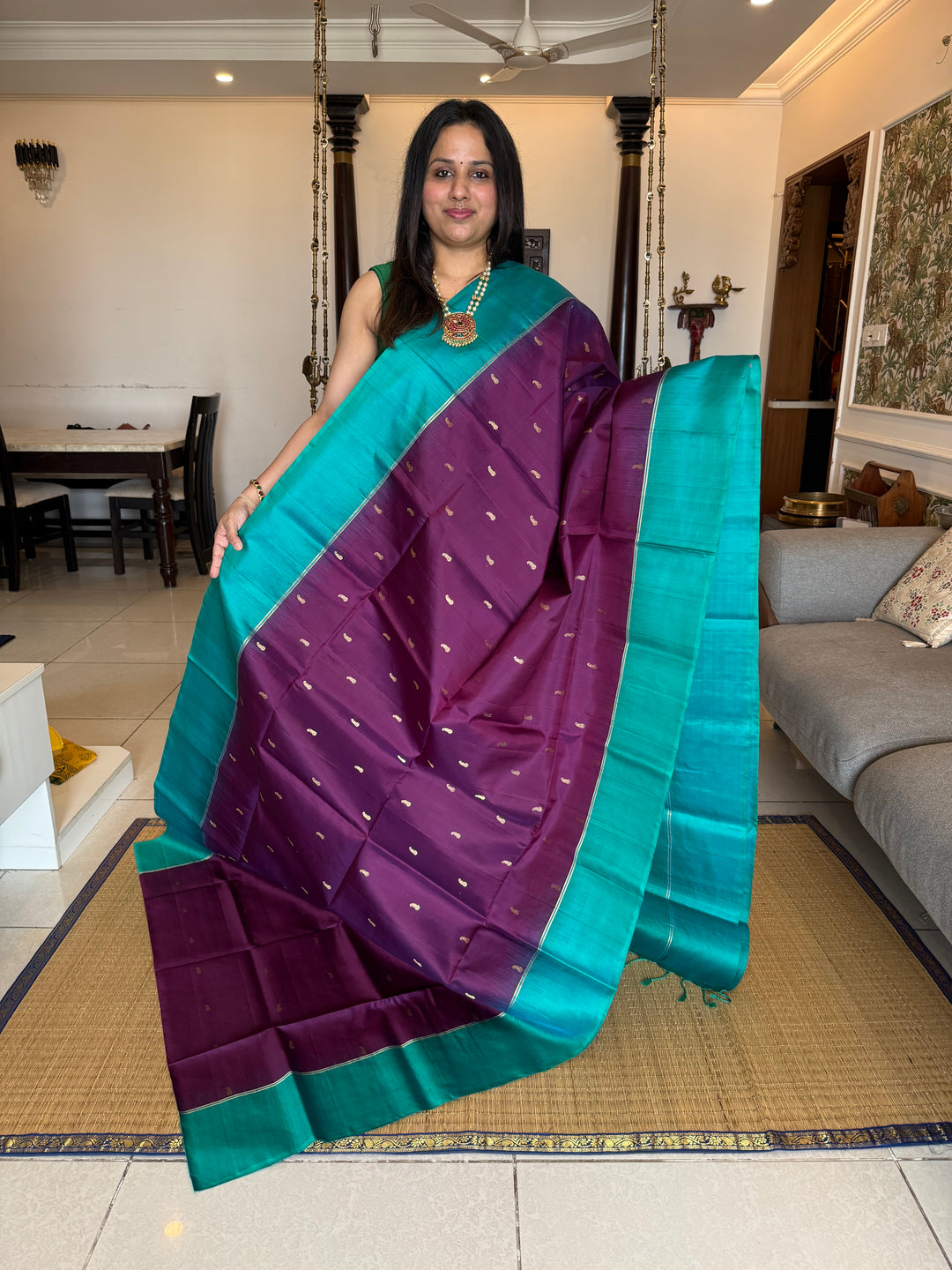 Purple with Turquoise Blue , Mango zari motif in the body , plain borders and rich Pallu , pure soft silk saree