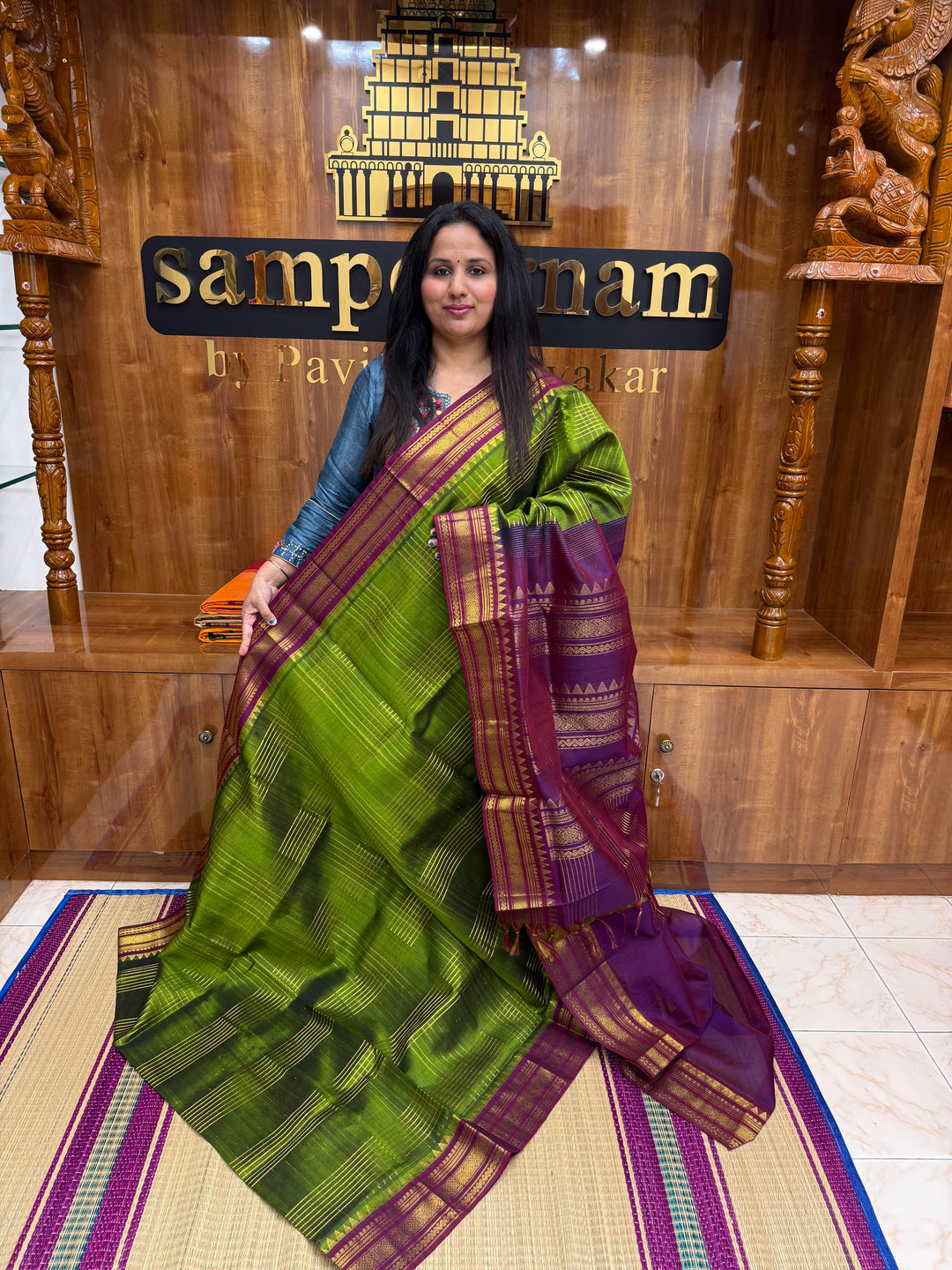 Green with Dark Magenta , Zari Checks in the body , Traditional borders and Rich Pallu Korvai Silk Cotton Saree
