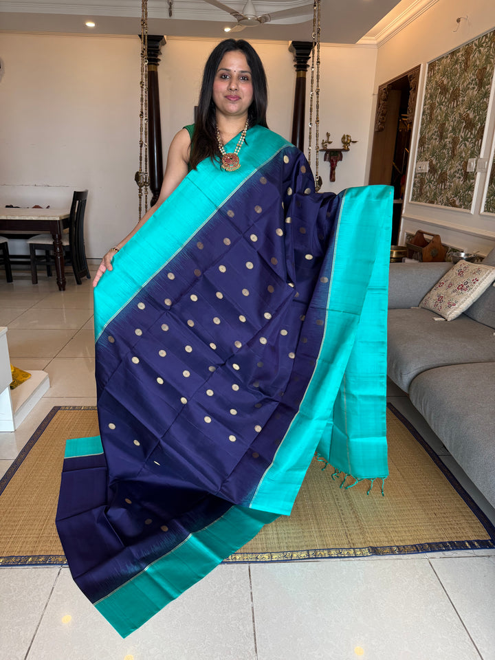 Dark Blue with Light Blue , rich zari rudraksh butta in the body and  grand Pallu , pure soft silk saree