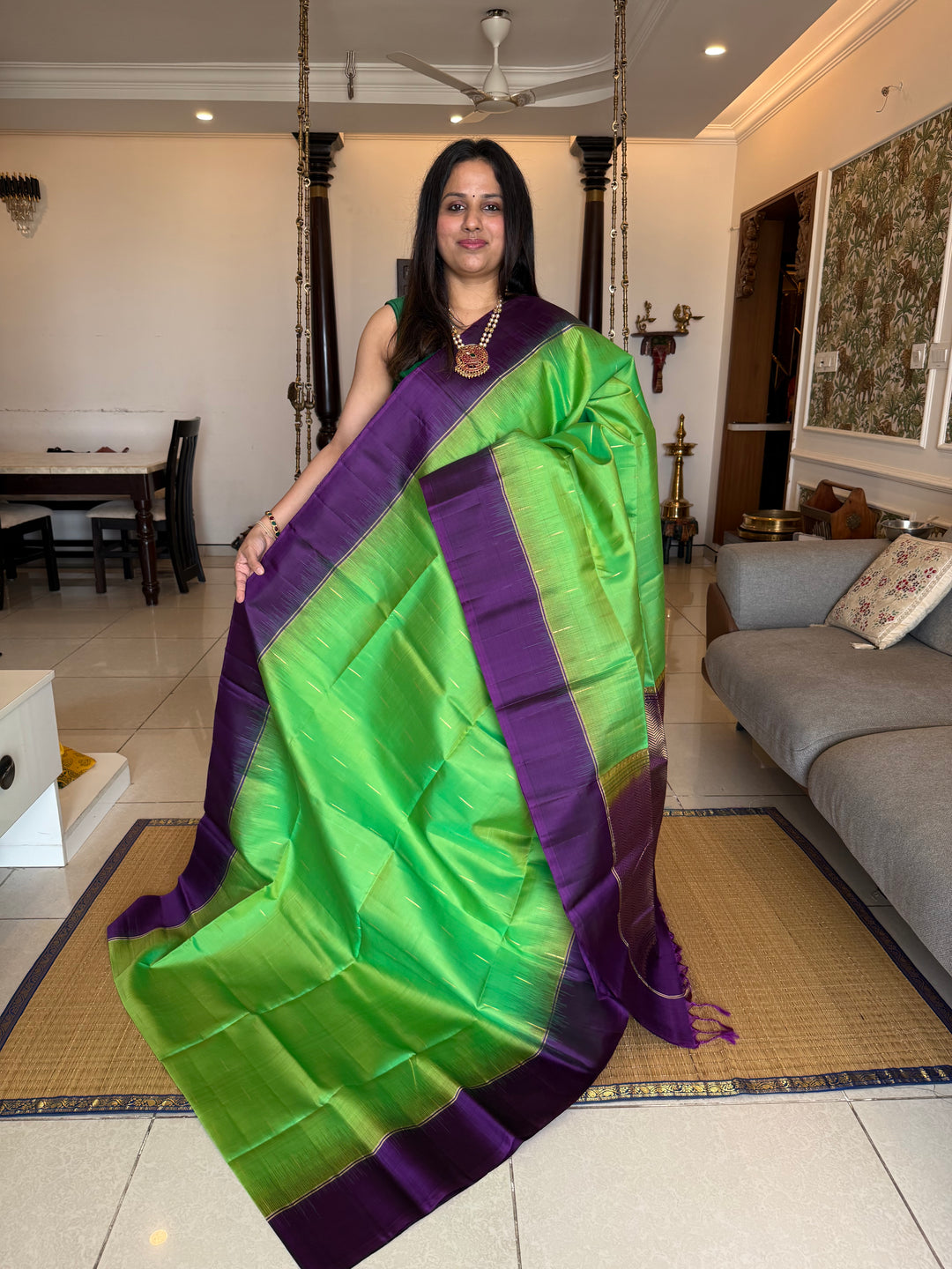 Parrot Green with purple , zari raindrop motif in the body , plain borders and rich Pallu , pure soft silk saree