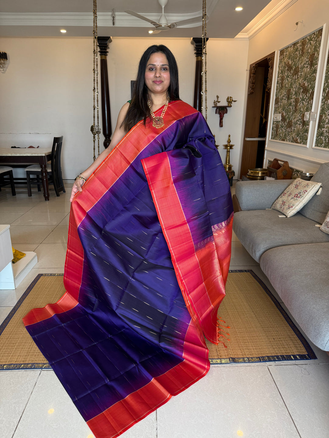Indigo Blue with Orangish Pink raindrop zari motif in the body , vairaoosi borders and rich Pallu , pure soft silk saree