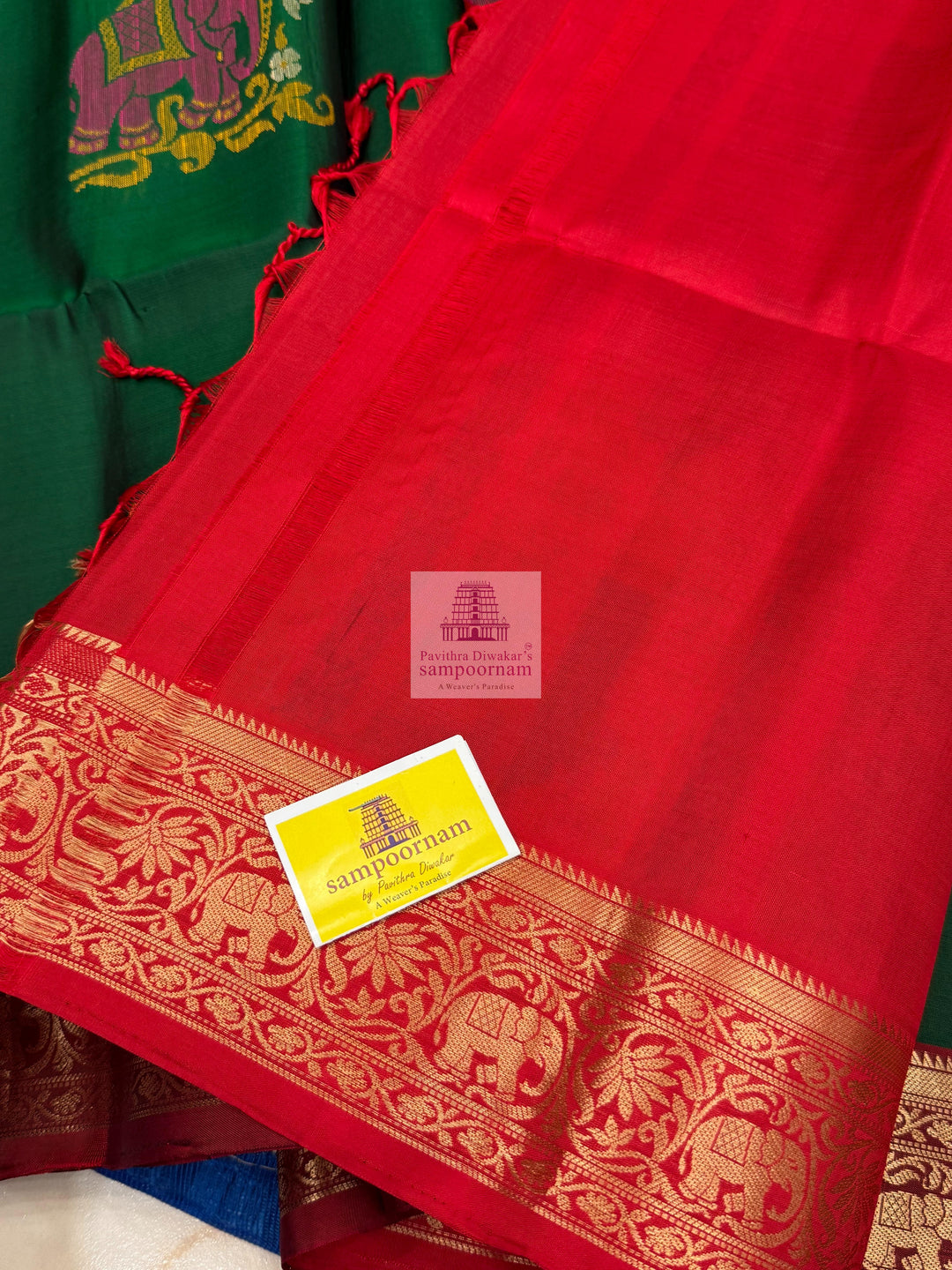 Green with Red , Thread butta in the body , rich Kanchi border and grand  Pallu Pure Soft Silk Saree