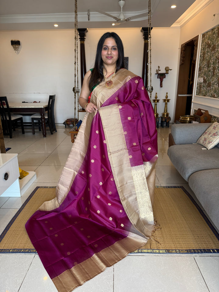 Dark Wine with Beige , rich Zari annam and rudraksh butta in the body and vairaoosi border , pure soft silk saree