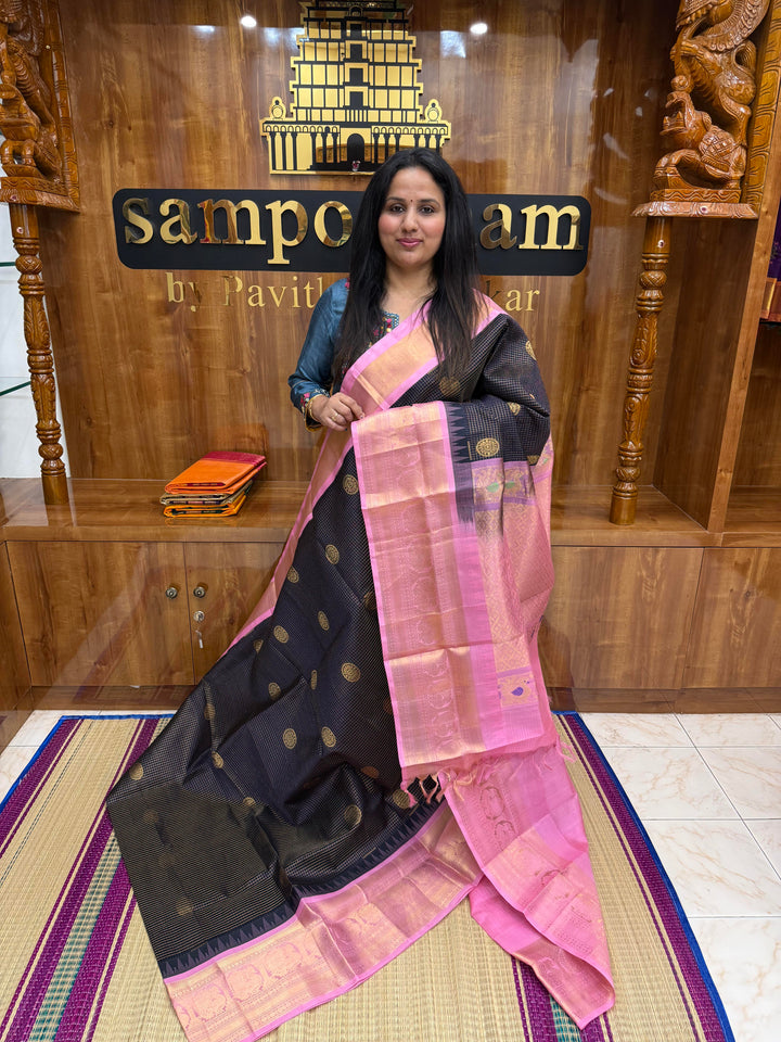 Dark Blue with Baby Pink , Rich Zari checks with Chakkram butta in the body , Traditional One side big border and rich Pallu Korvai Silk Cotton Saree