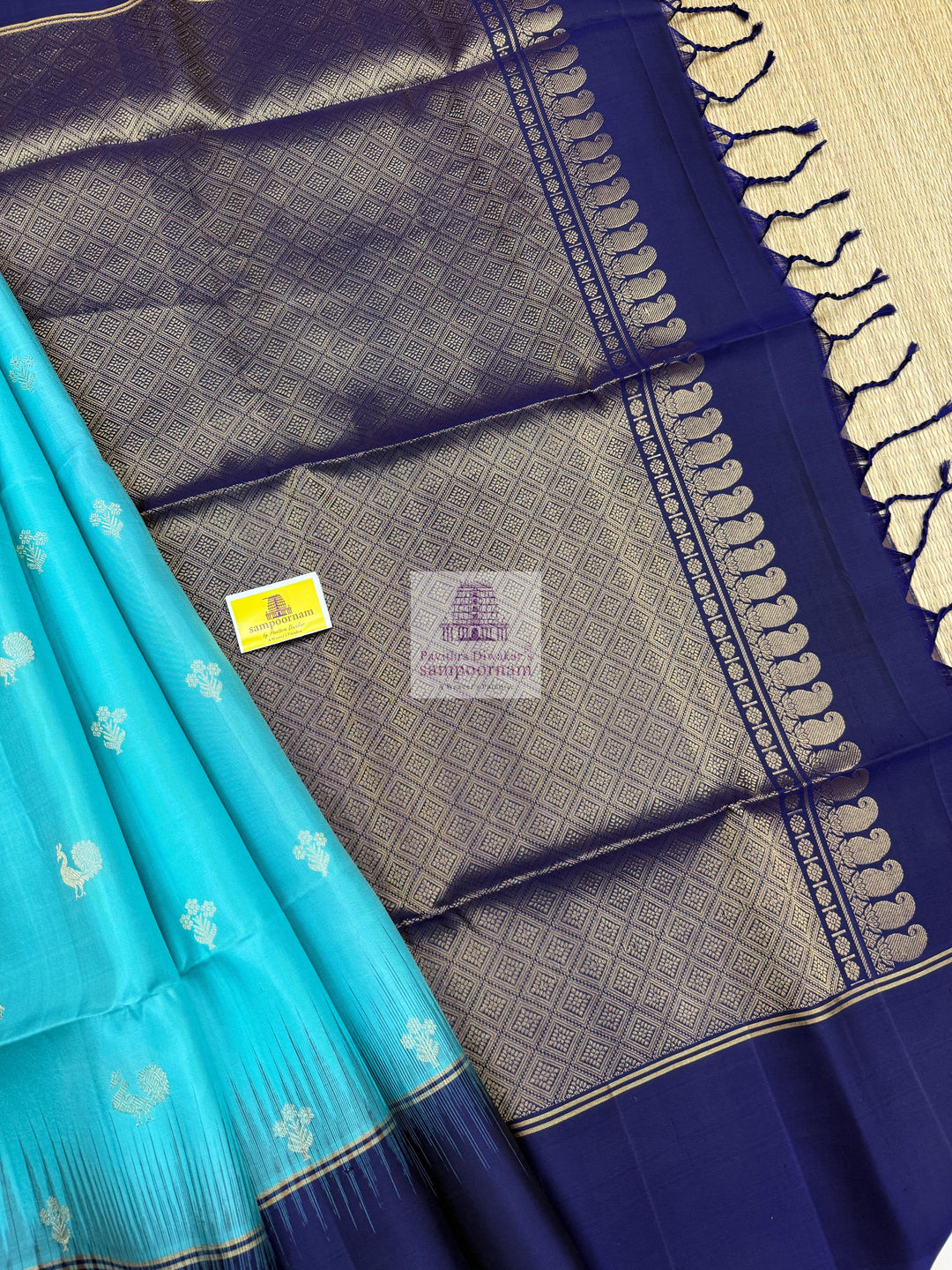 Blue with Dark Blue ,  Vairaoosi lines in the border , Annam and Floral butta in the body and rich Pallu Pure Soft Silk Saree