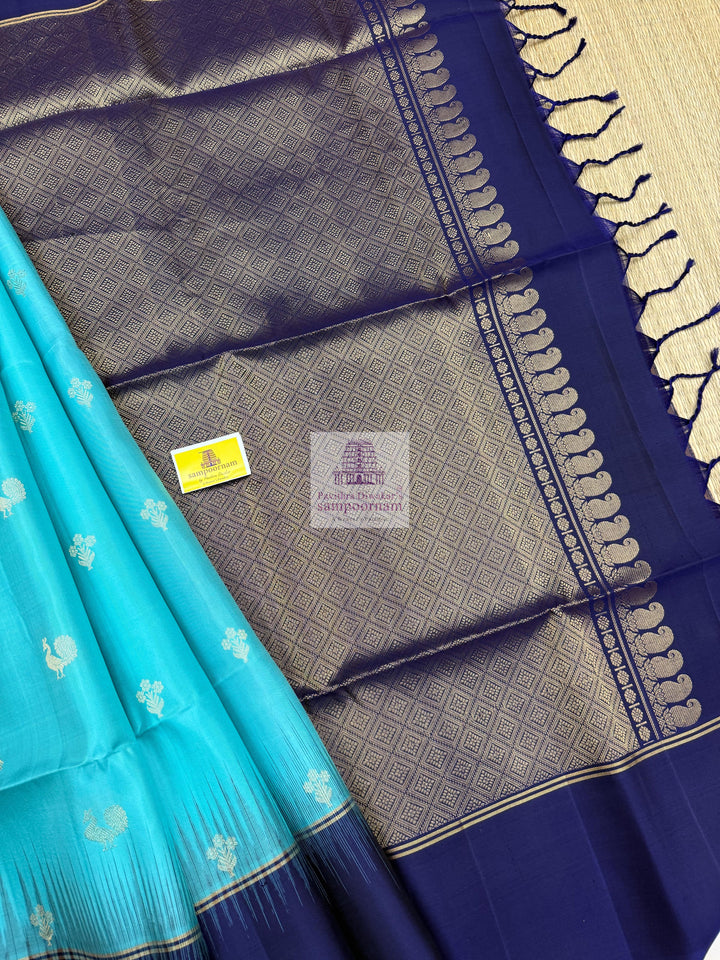 Blue with Dark Blue ,  Vairaoosi lines in the border , Annam and Floral butta in the body and rich Pallu Pure Soft Silk Saree