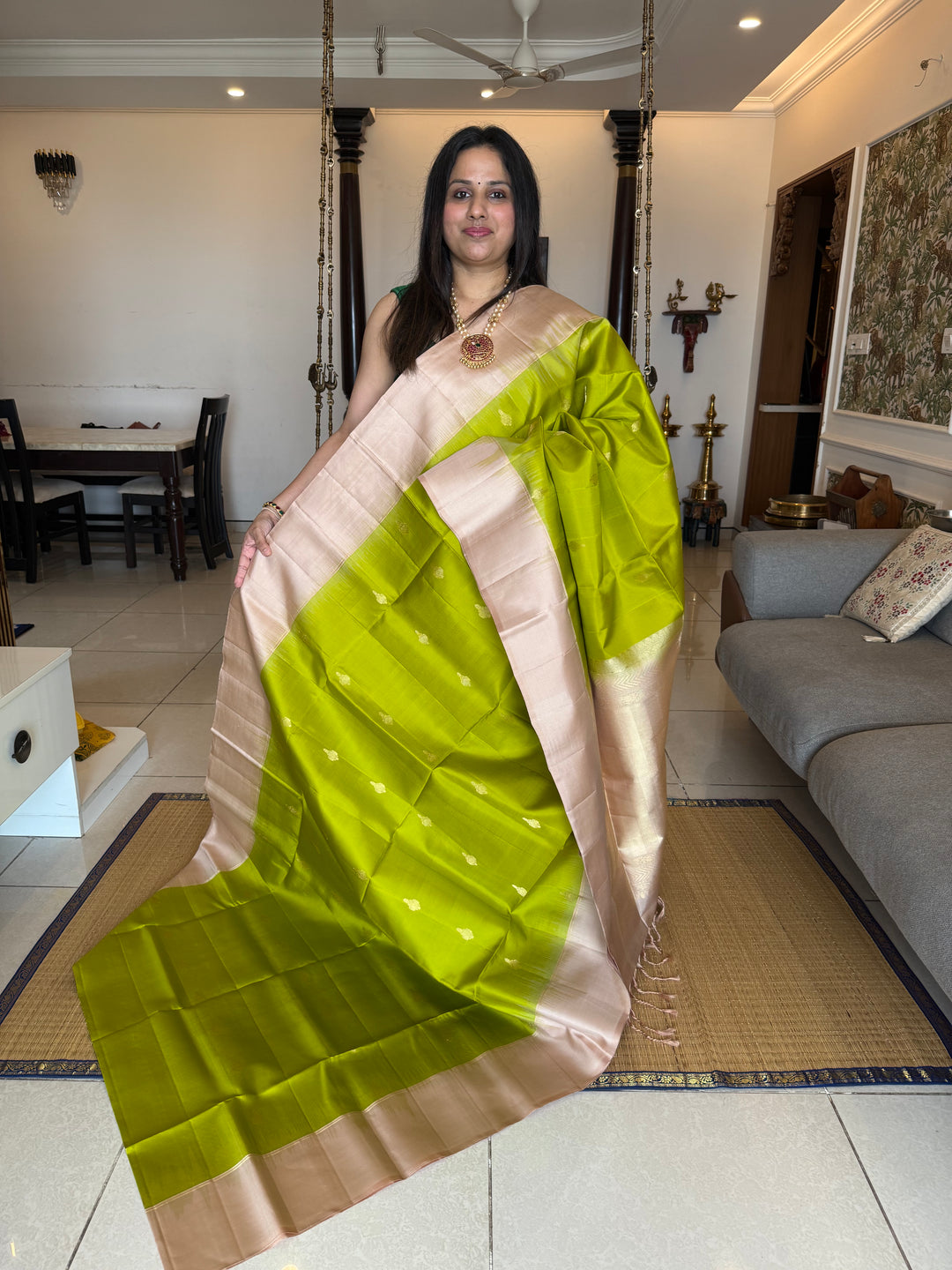 Light Green with Beige rich zari butta in the body , plain borders and rich Pallu , pure soft silk saree